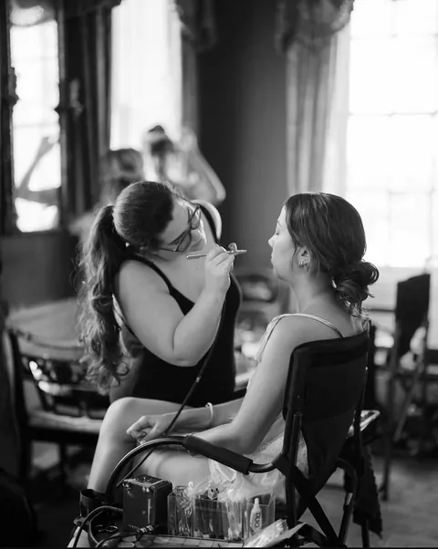 Elana, Wild Ivory bridal artist, at work